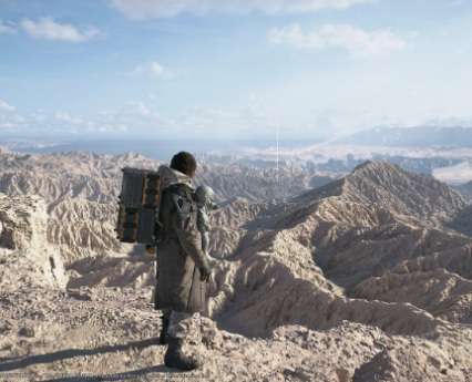 A character in Death Stranding 2 looking out over a vast and desolate new landscape, highlighting one of the key differences in the sequel.