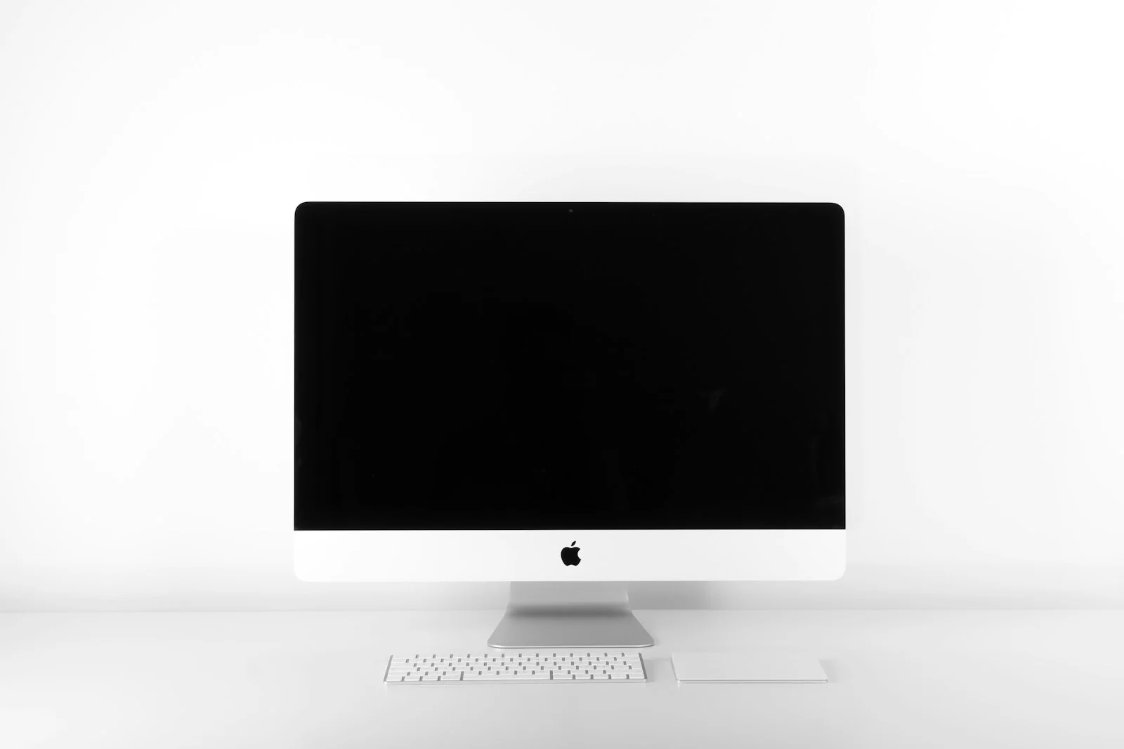 DisplayPort and HDMI cable connectors plugged into high-end gaming graphics card and 4K monitor
