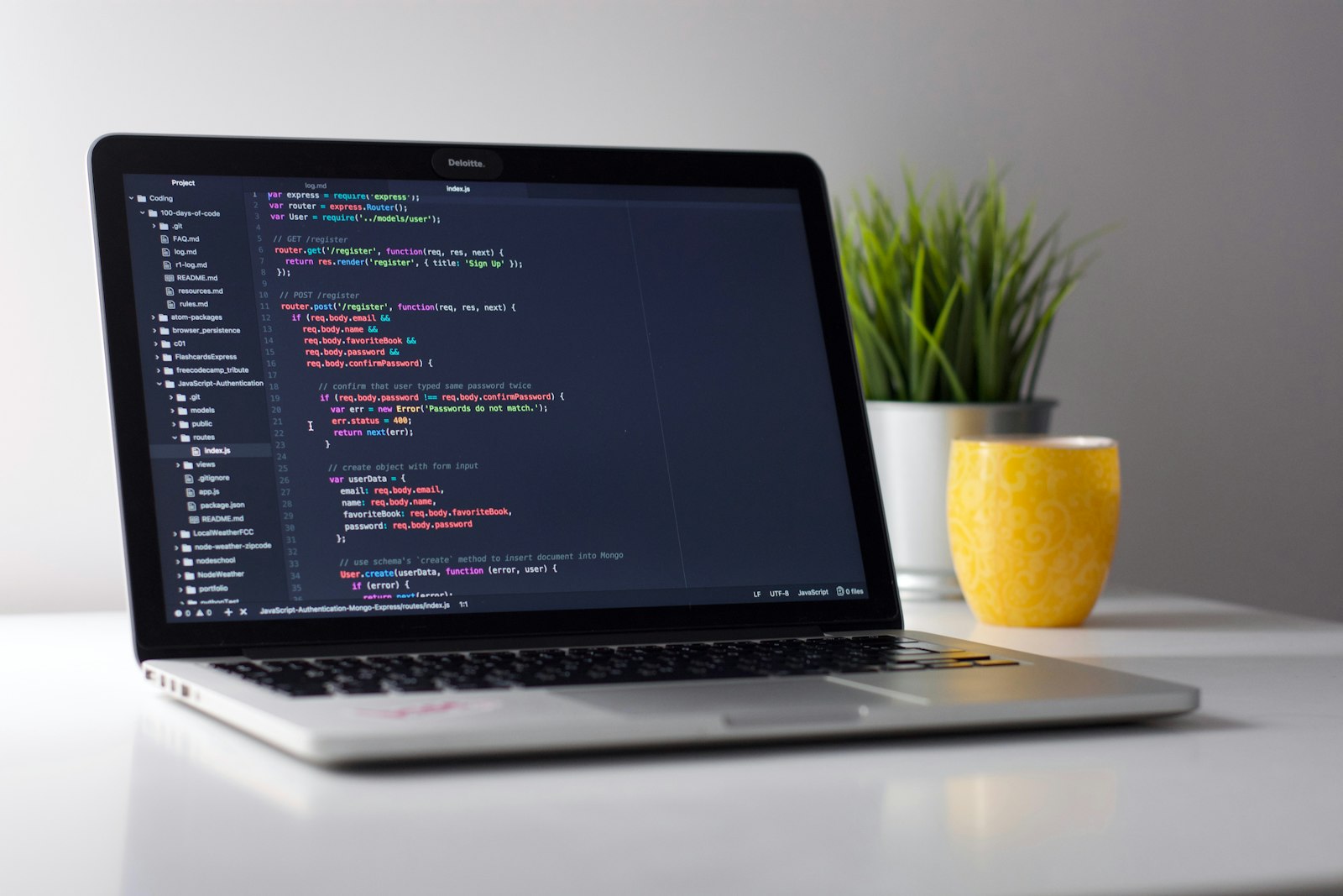 Developer working on laptop connected to secure zero-trust network tunnel remotely
